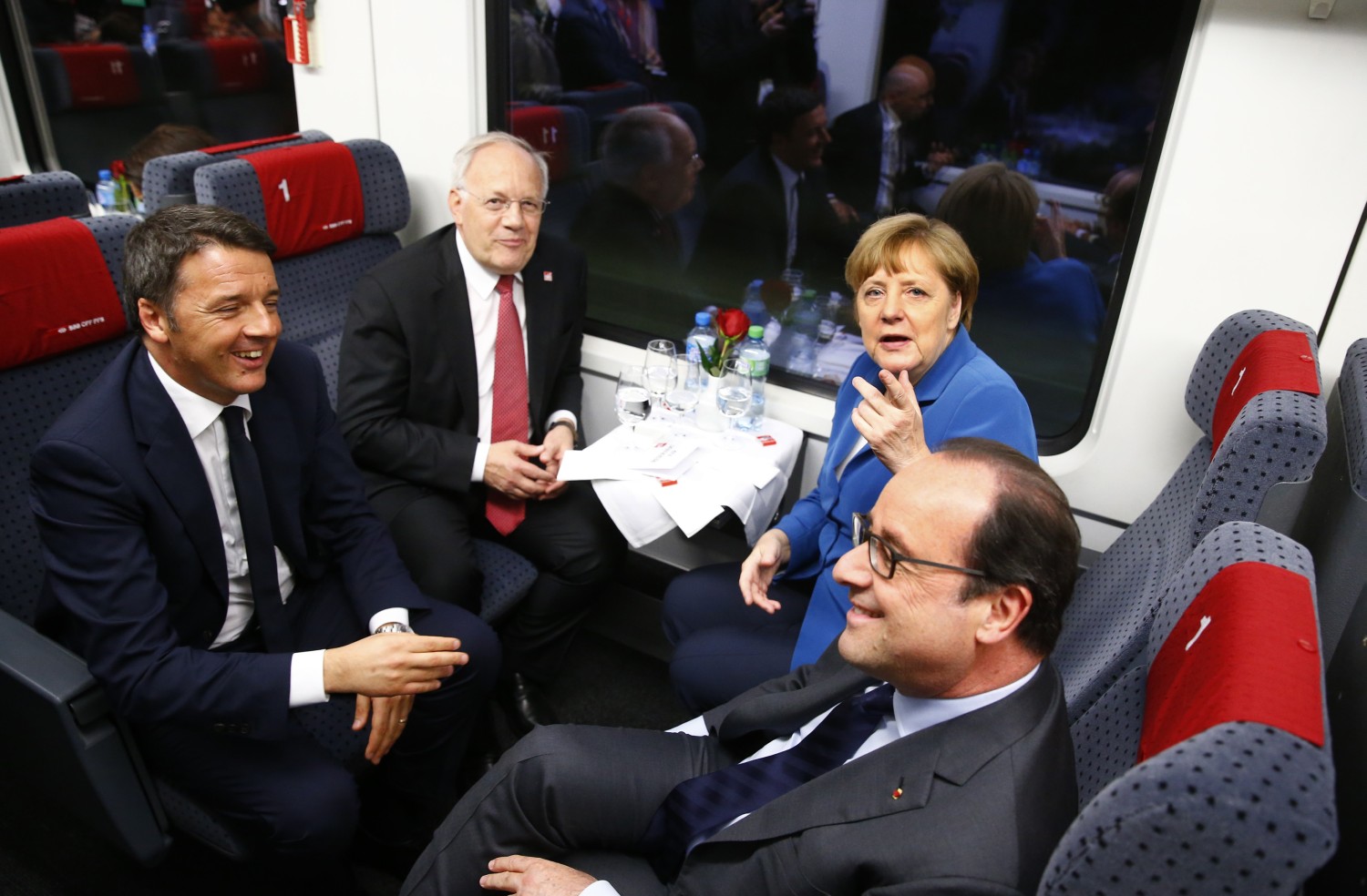 Italian PM Matteo Renzi, Swiss President Johann Schneider-Ammann, Germany Chancellor Angela Merkel and French President Francois Hollande on board the maiden voyage on the line.