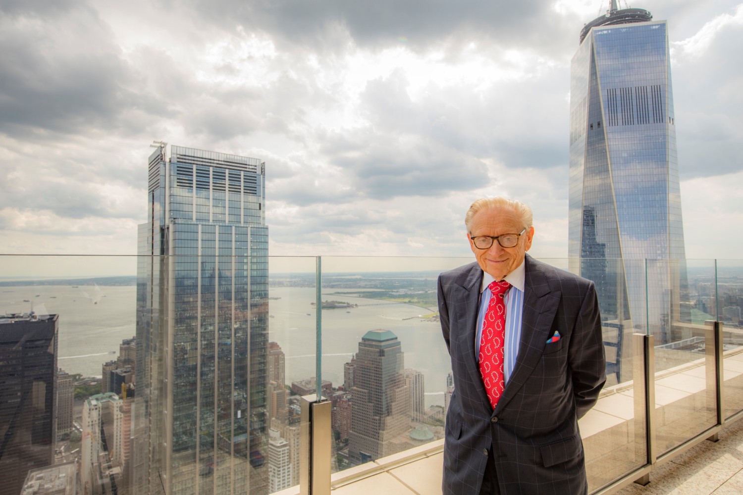 Larry Silverstein on a terrace of his 80th-floor apartment in 30 Park Place, overlooking the World Trade Center.